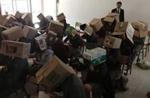 为了防作弊 这位墨西哥老师让学生头戴纸箱考试