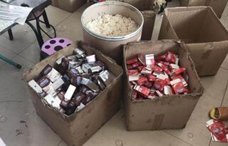 触目惊心! 警方查获50万盒假避孕套!